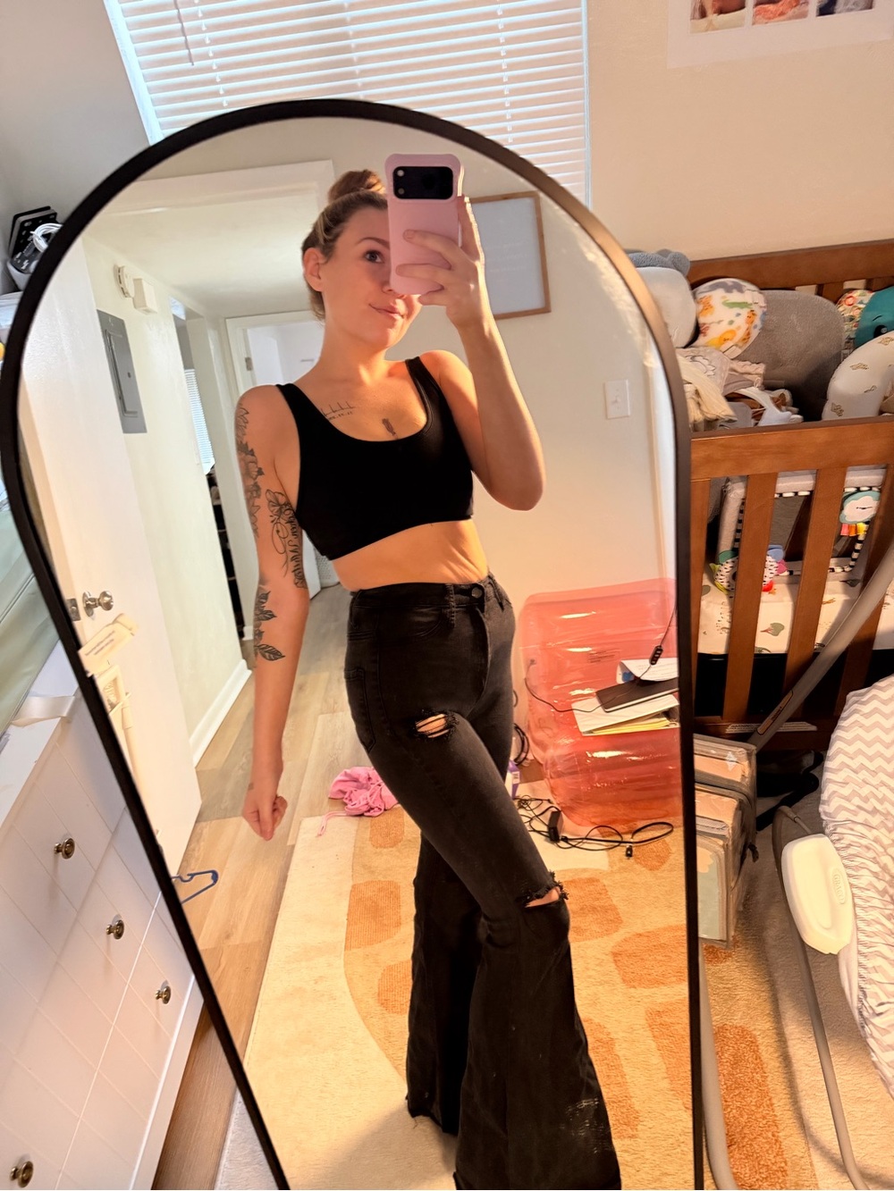 Vibrant Black High-Waist Flare Jeans with Knee Rips